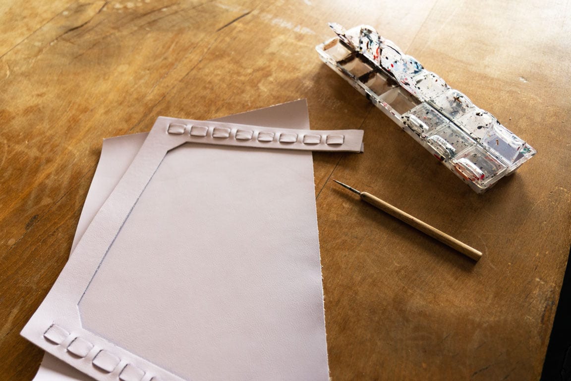 Here the leather edges are dyed purple for the Mathilde crafted small.