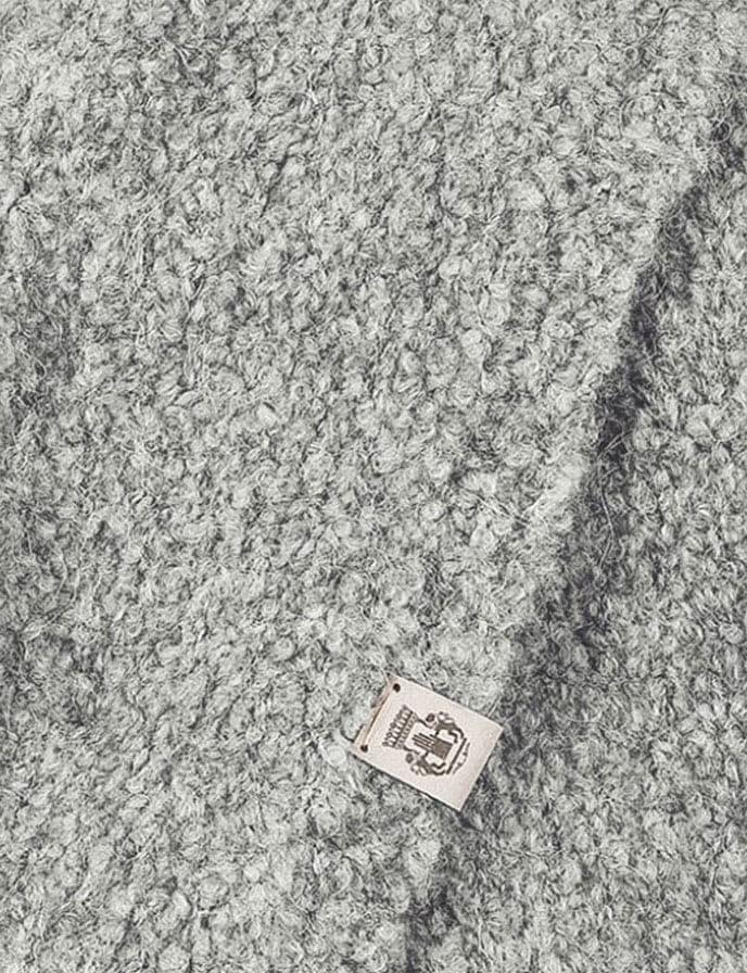 Alpaca wool with fine curl and unique thermal properties