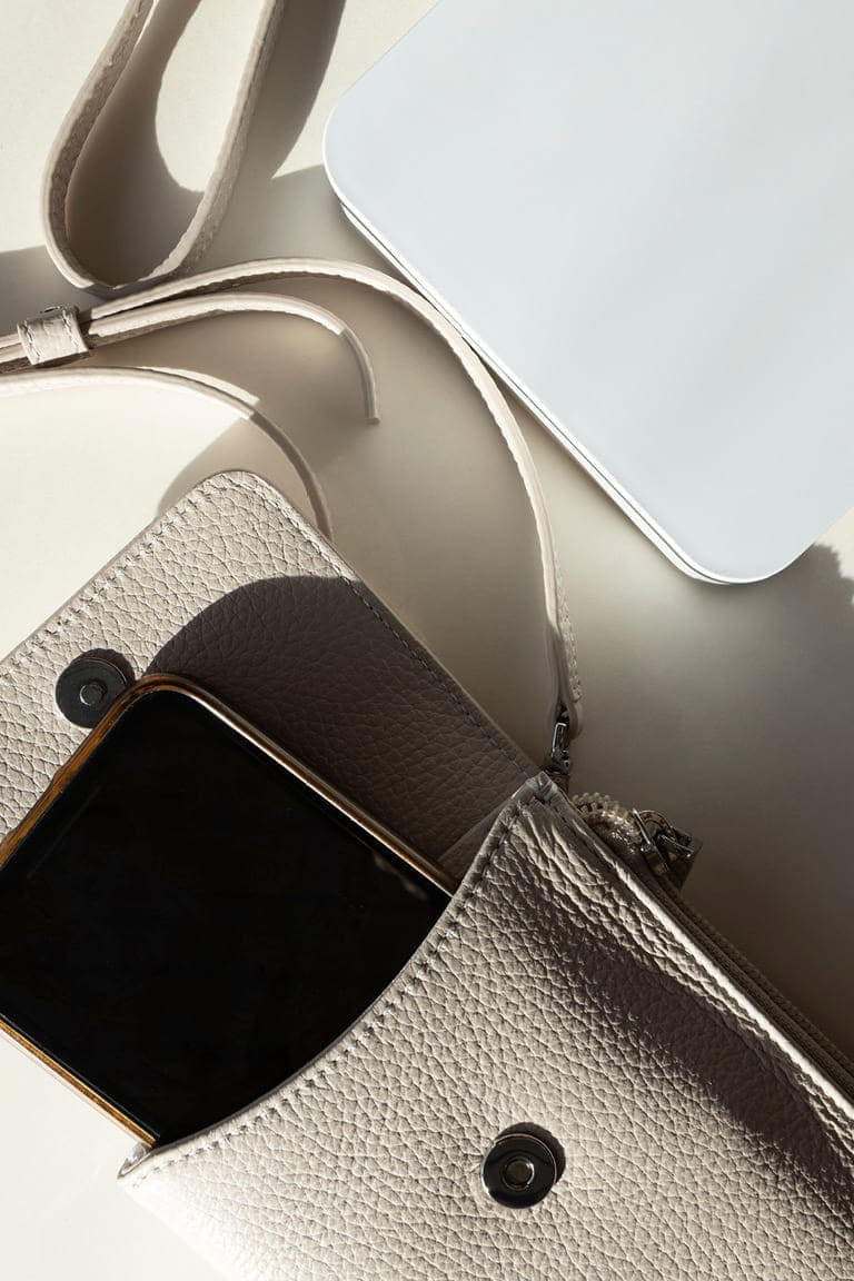 Cross-body leather cell phone case in beig leather