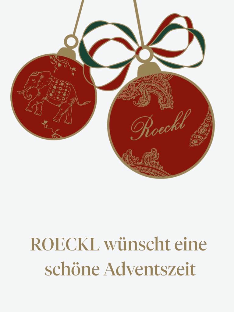 ROECKL Tuch weht im Wind vor Landschaft im Hintergrund