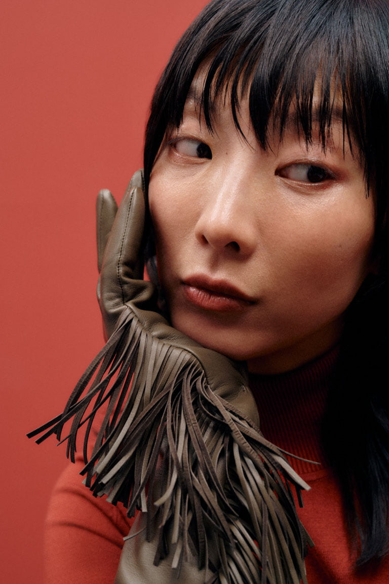 Lederhandschuhe Phoenix in grün aus Haarschaf-Nappaleder mit Lederfransen